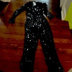 H and M sequins long sleeve romper. Never worn. XS